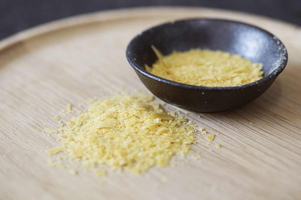 Yellow carnauba wax flakes from the Cerax natural wax range